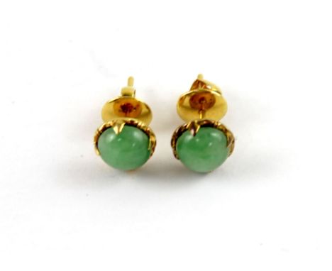A pair of 14ct yellow gold jade-set stud earrings.