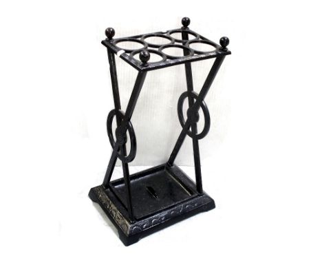 A late 19th century cast iron hall stick umbrella stand in the manner of Christopher Dresser.