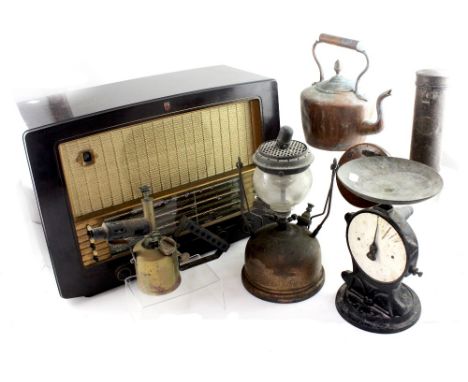 A vintage set of weighing scales (af), an oil can, a copper kettle, a lamp, blowtorch and a vintage c1940s radio (2).
