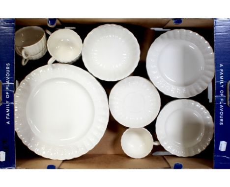 A Spode 'Chelsea Wicker' pattern blanc de Chine part dinner and tea service comprising dinner plates, starter plates, side pl