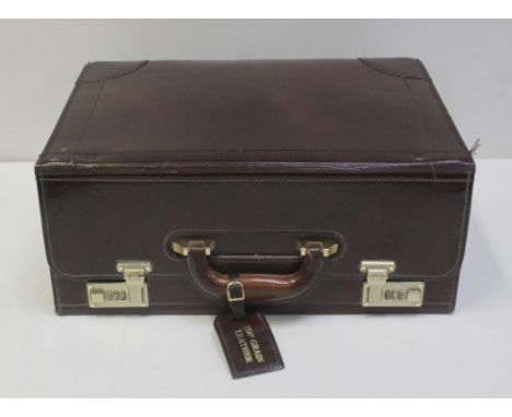 A vintage burgundy leather lockable document case.
