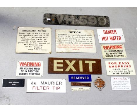 A small group of metal signs to include a vintage number plate 'MVH599', an 'Exit' sign and various other shop and building s