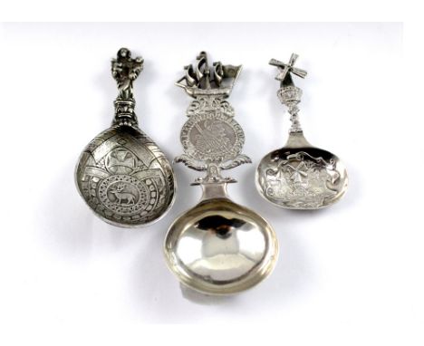 Three hallmarked silver tea caddy spoons, a Celtic design with figural handle of Madonna, John the Baptist and Jesus above a 