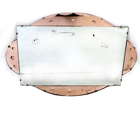 An Art Deco style wall mirror with arched peach glass panels and central floral design, 54 x 78cm.