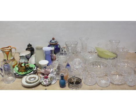 A quantity of cut glass and crystal to include bowls of varying sizes, water jug, vase, glass bell, decorative vases and vari