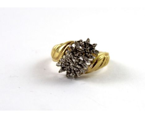 A 9ct yellow gold ladies' dress ring, leaf design set with tiny diamonds, size L, approx 4.3g.