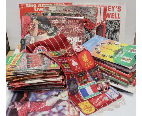 A large quantity of Liverpool Football Club memorabilia dating to the 1980s-90s including programmes, calendars, annuals and 