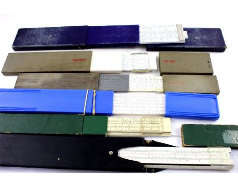Six cased slide rules including examples by Senior, length 38cm, Aristo, Castell etc (6).