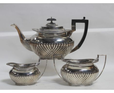An Edward VII hallmarked silver three-piece tea service, J.W.B, Sheffield 1901, combined approx 41.96ozt.