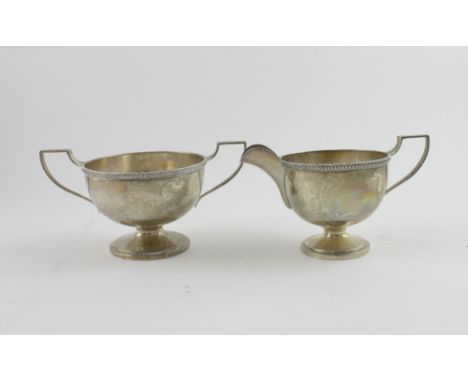 An Edward VIII hallmarked silver footed sucrier and milk jug, height 8.5cm, Walker &amp; Hall, Sheffield 1936, approx 8.5ozt 