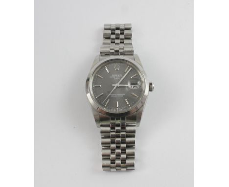 ROLEX; a boxed Oyster Perpetual Superlative chronometer gentlemen's wristwatch, the dark silvered dial set with baton numeral