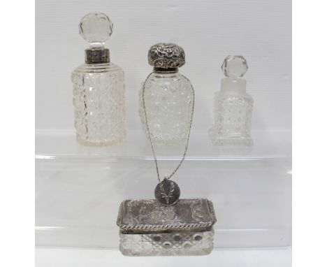 A trinket box with hallmarked silver top, various cut glass dressing table bottles, some with hallmarked silver collars and t