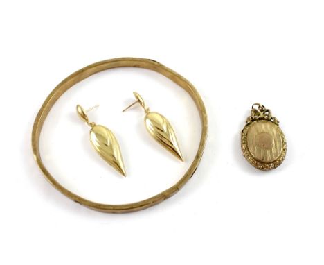 A 9ct yellow gold bangle (af), a pair of 9ct gold drop earrings and a yellow metal locket, combined approx 8.8g and two vinta