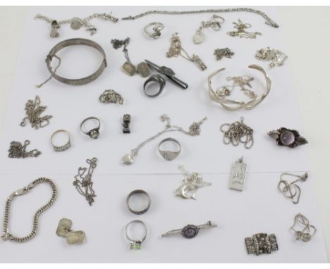 A quantity of silver and white metal jewellery to include link bracelets, pair of cufflinks, gentlemen's signet ring, bangles