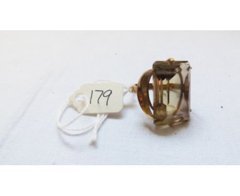 Large yellow stone dress ring set in  9ct approx size K       