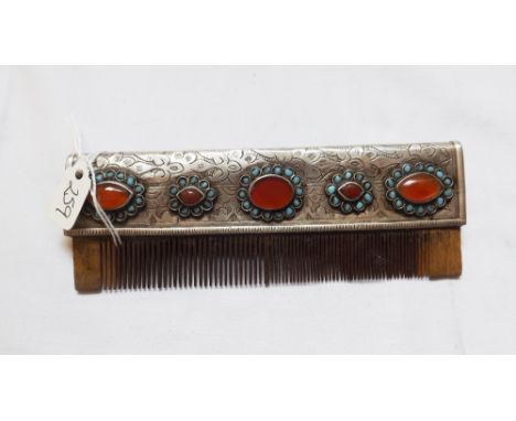 Unusual silver mounted stone set comb    