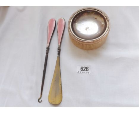 A jar with glass body and enamel shoe horn plus button hook  