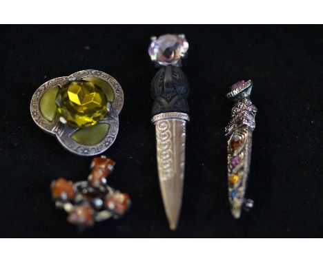 4 Celtic brooches 