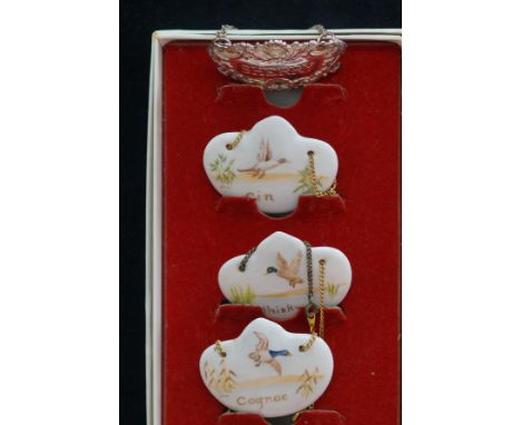 3 Ceramic decanter labels &amp; 1 silver plated 