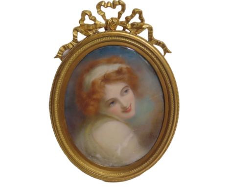 A MINIATURE OF EMMA HAMILTON AFTER ROMNEY, 1898
with monogram and dated '98' (lower right), displaying detail of Emma as a ba