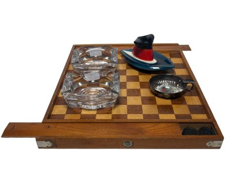 S.S. FRANCE: A COLLECTION OF MEMORABILIA AND EPHEMERA INCLUDING THE WORLD CRUISE OF 1974
including a wooden draughts board wi