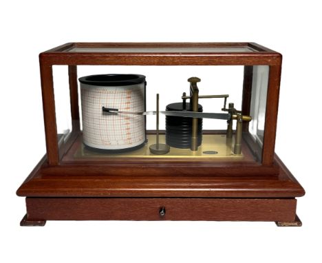 A BAROGRAPH BY CASELLA, LONDON, CIRCA 1980
battery operated, lacquered brass mechanism with pressure drum, clockwork recordin