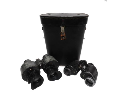 A KRIEGSMARINE OFFICER'S ERNST LEITZ BINOCULARS CASE, 1943
the black leather case with embossed mark and naval 'M' to lid, wi