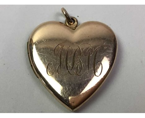 GROUP OF SIX VINTAGE GOLD PLATED LOCKETS AND THREE STICKPINS  one locket in the shape of a heart, along with three stickpinsQ