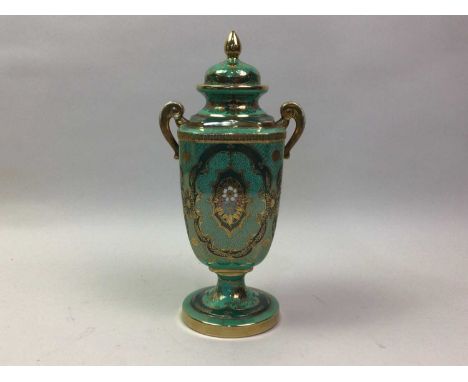 NORITAKE TWIN HANDLED VASE .with floral and gilt decoration on a green ground 31cm high