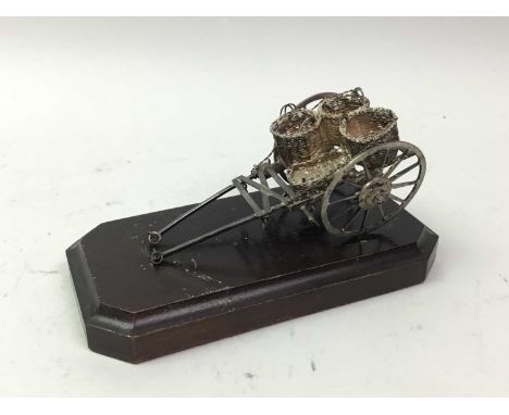 STERLING SILVER MODEL OF A CART AND OTHER ITEMS  including a model of a boat, medal and a Swatch wrist watch