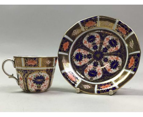 ROYAL CROWN DERBY PART TEA SERVICE comprising five cups, sugar bowl, six saucers and six side platesStains present to some cu