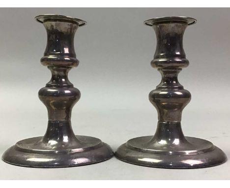 PAIR OF CONTINENTAL SILVER CANDLESTICKS ALONG WITH AN ART DECO BAROMETER the candlesticks with circular bases, stamped 925, t