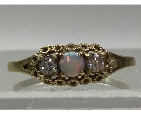 NINE CARAT GOLD OPAL AND DIAMOND RING boxed