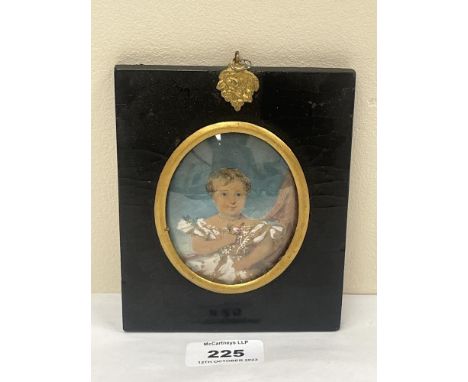 A 19th century portrait miniature of a young child - The ebonised frame 5¼" high.