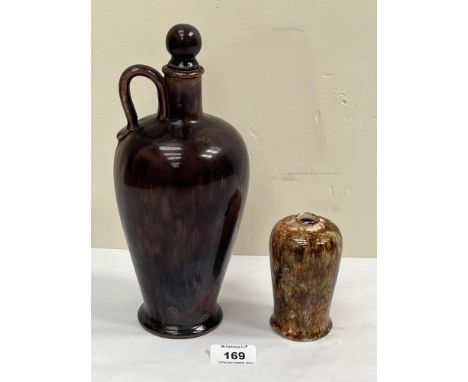 A Royal Doulton whisky flask and stopper, no 15438, 10¼" high; together with a small mottle glazed vase, 4¼" high.