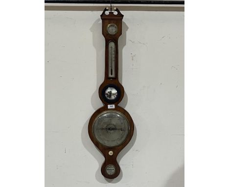 A 19th century mahogany mercurial wheel barometer with silvered dial, level hygrometer and temperature scale. 38½" high.