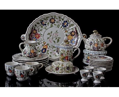 Tichelaar Makkum earthenware tableware with polychrome floral decor, consisting of 12 plates 22.5 cm diameter, 12 plates 19.5