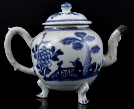 Porcelain teapot with blue decor of pine tree and peony near a garden gate with swastikas, China Qianlong period ca. 1760, 13