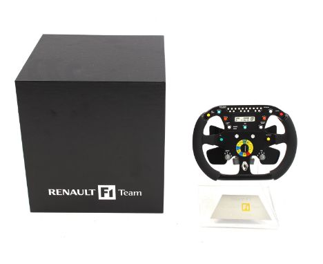 Norev scale model steering wheel Renault F1 Team, no. 0425/3000, on stand, in black box, box size 20 cm high, 19x19 cm