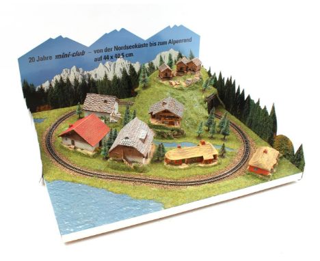 Märklin model for. 20 years Mini-Club of the Nordseeküste bis zum Alpenrand auf 44x40.5 cm, with 4 boxes for the houses shown