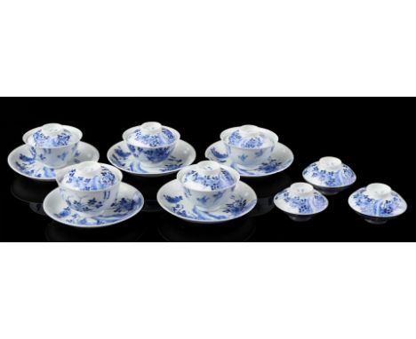 5 eggshell porcelain cups and saucers with 8 lids with blue decor of birds in floral surroundings, marked, Japan Arita 19th c