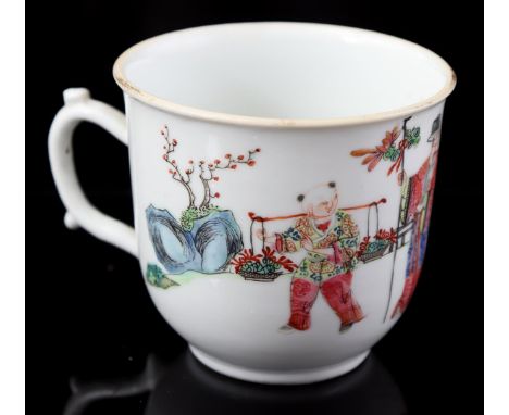 Porcelain Famille Rose cup with decor of people at a garden gate and rock, China Daoguang marked and period ca. 1840