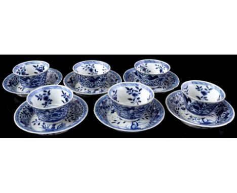 7 porcelain cups and 6 saucers with blue floral decor with roosters, marked with artemisia leaf, China Kangxi period (2 cups 