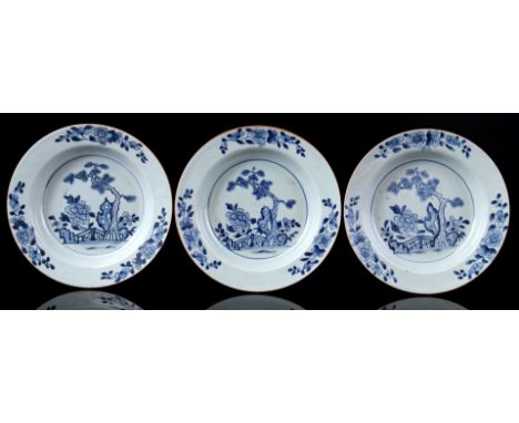 3 porcelain dishes with floral decor and garden gate with pine tree in the heart, China Qianlong period ca. 1780, 23 cm diame