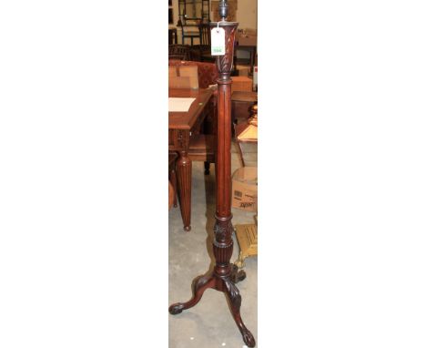 	An Edwardian mahogany lamp standard
