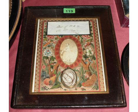 	A Victorian framed and mounted portrait photograph and lock of hair, apparently that of HRH Princess Helena, third daughter 