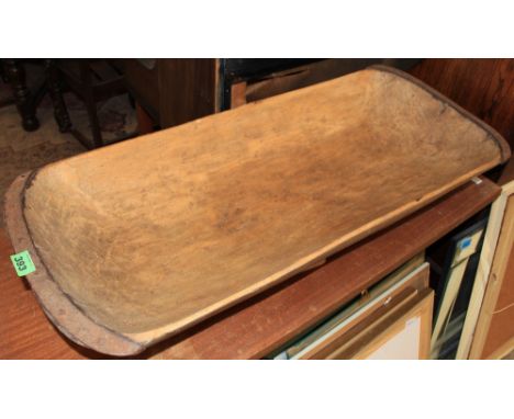 	A treen and iron mounted feeding trough 36' wide (worm holes treated)