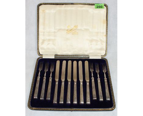 	A cased set of silver handled knives and fork for six places. Sheffield 1915