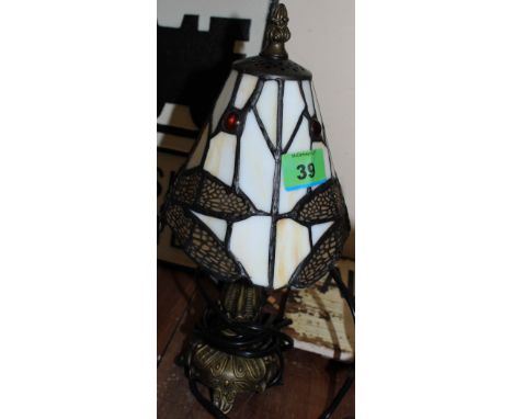 	A small Tiffany style table lamp