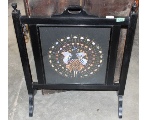 	A butterfly wing firescreen and a low table